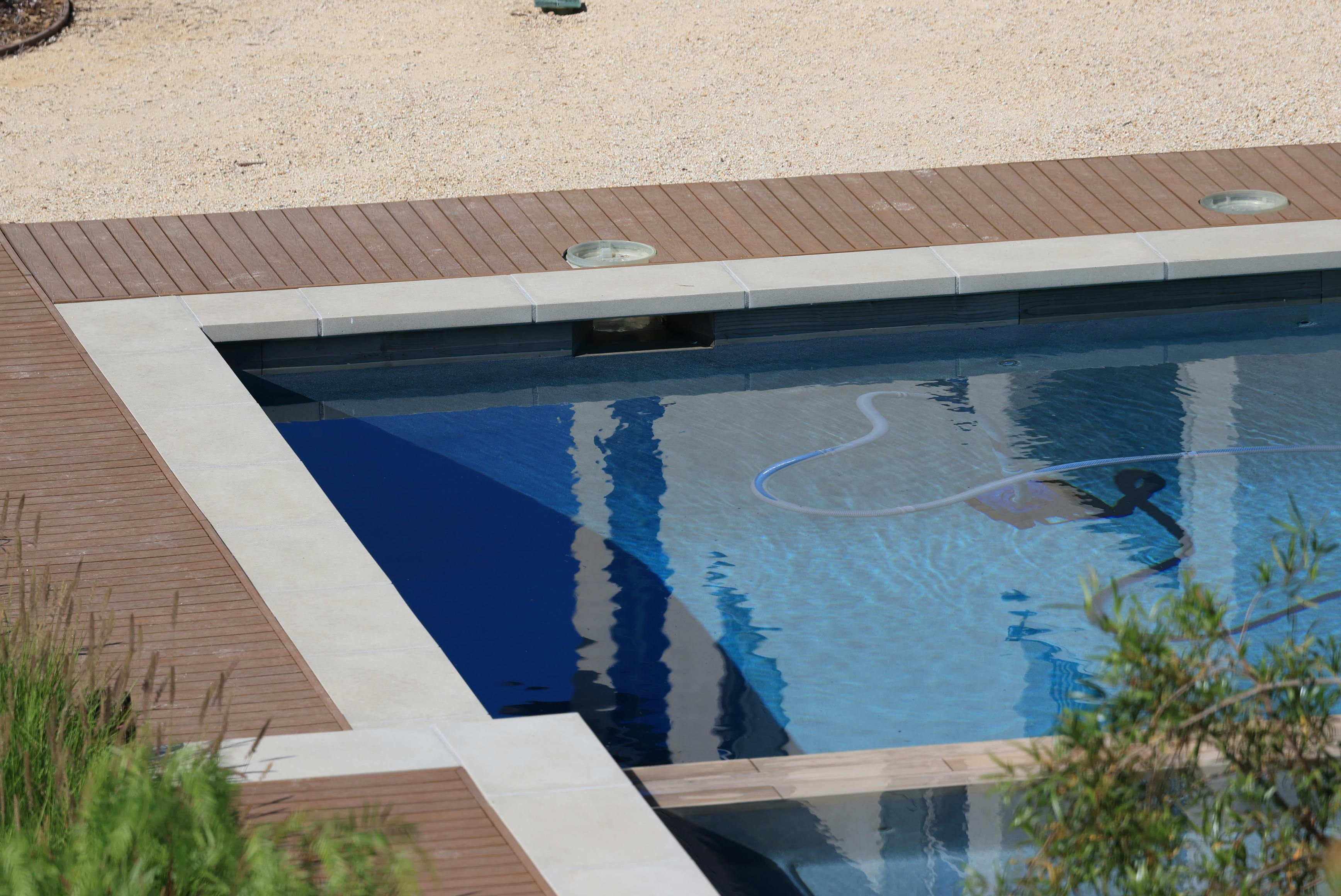 Designer pool with architectural lines — consultation and site planning